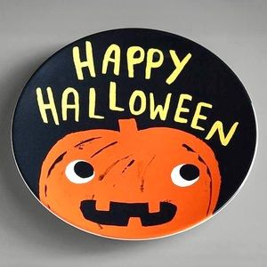 A Pottery barn kids Halloween Glow-in-the-Dark Pumpkin Jack O Lantern 9” Plate